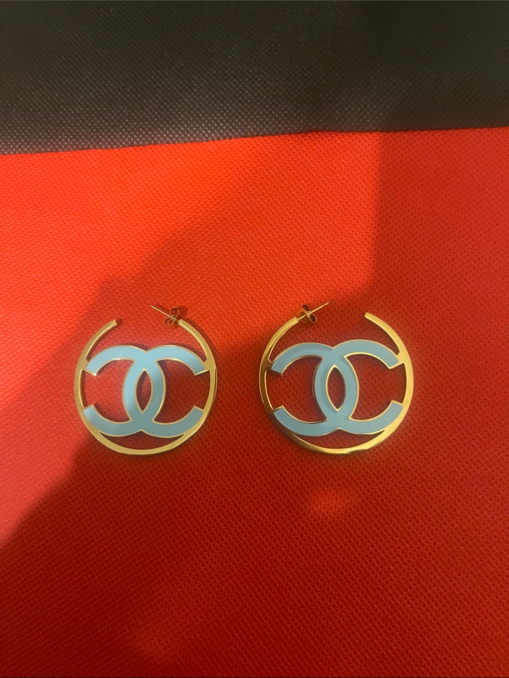 Stainless steel Gold Hoop Earrings with Light Blue Interlocking Motif